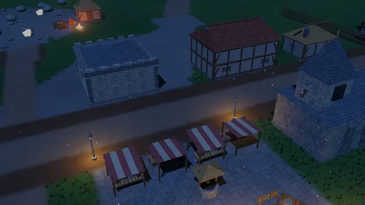 The same street at night, lit by lamp posts.
